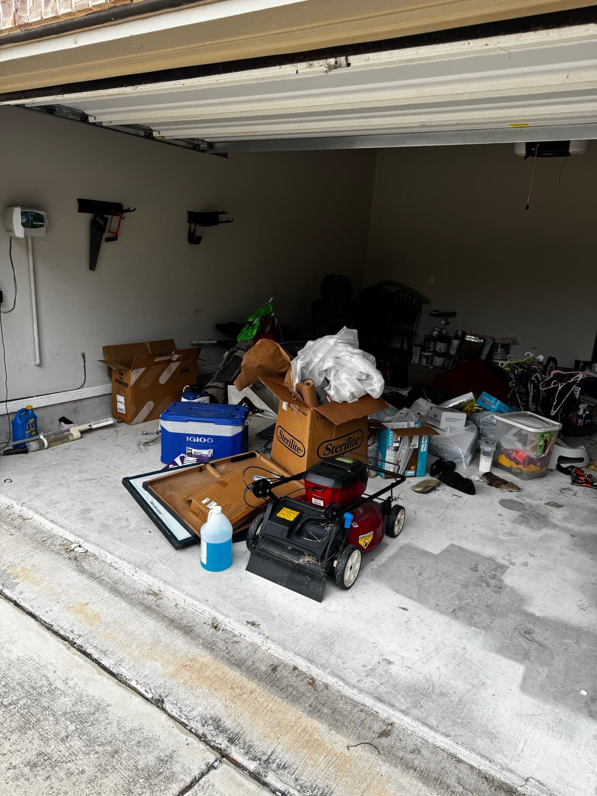 Garage before and after Dumpster Daddies cleanout (before)
