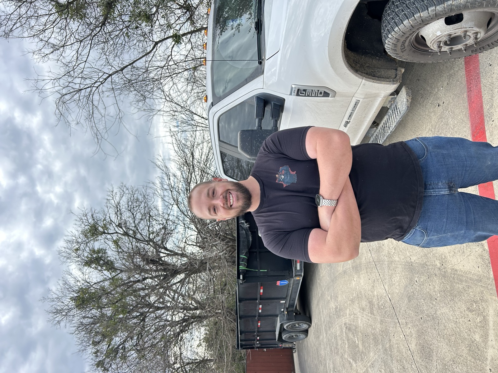 Gage from Dumpster Daddies Junk Removal with truck ready for service in Cedar Park, TX